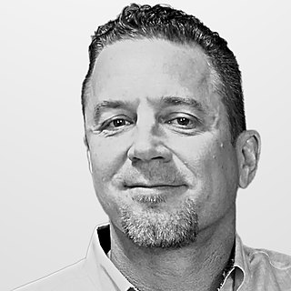 Paul M. Drew, co-author of My Client is the Devil